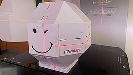 Position RUBY base phantom with Linac QA insert (type number PTW T40072.1.200) on the tilting base and align the laser / the couch to the red line of the phantom